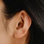 Hole in the Ear Spiritual Meaning: 9 Main Interpretations and Myths